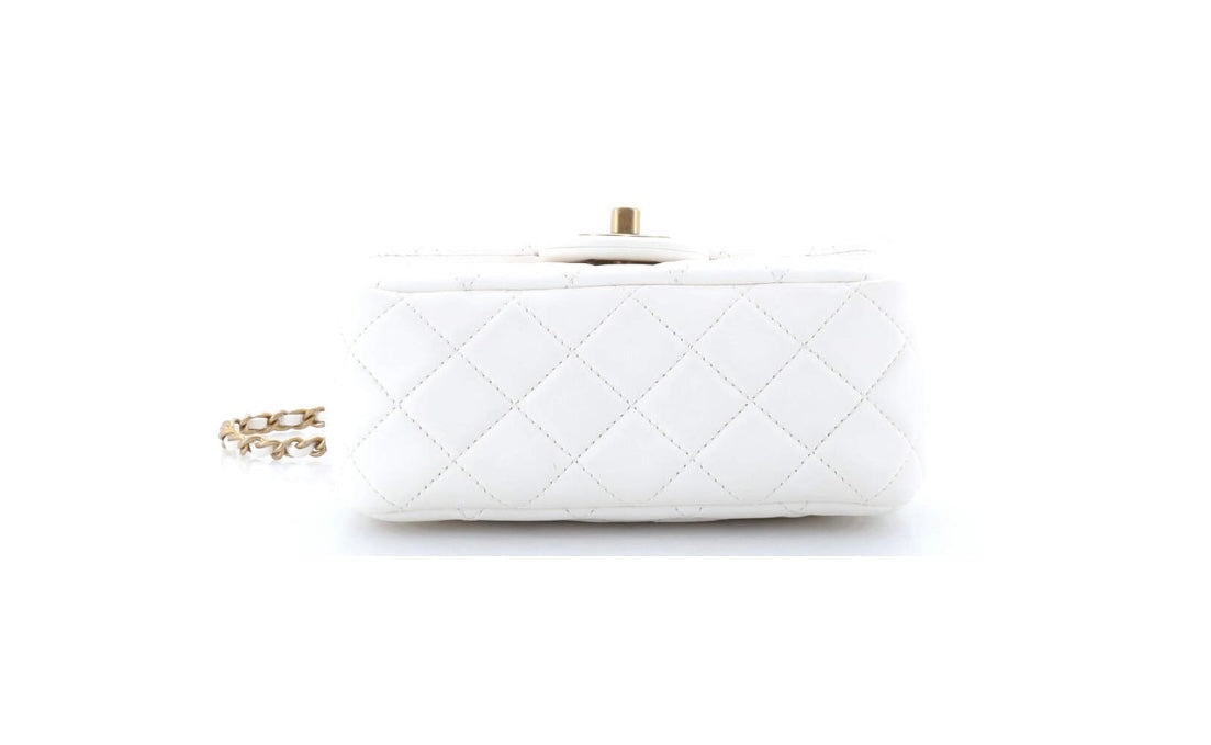 CHANEL
Lambskin Quilted CC Pearl Crush Mini Flap White