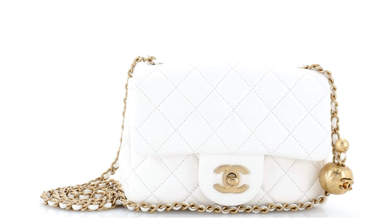CHANEL
Lambskin Quilted CC Pearl Crush Mini Flap White