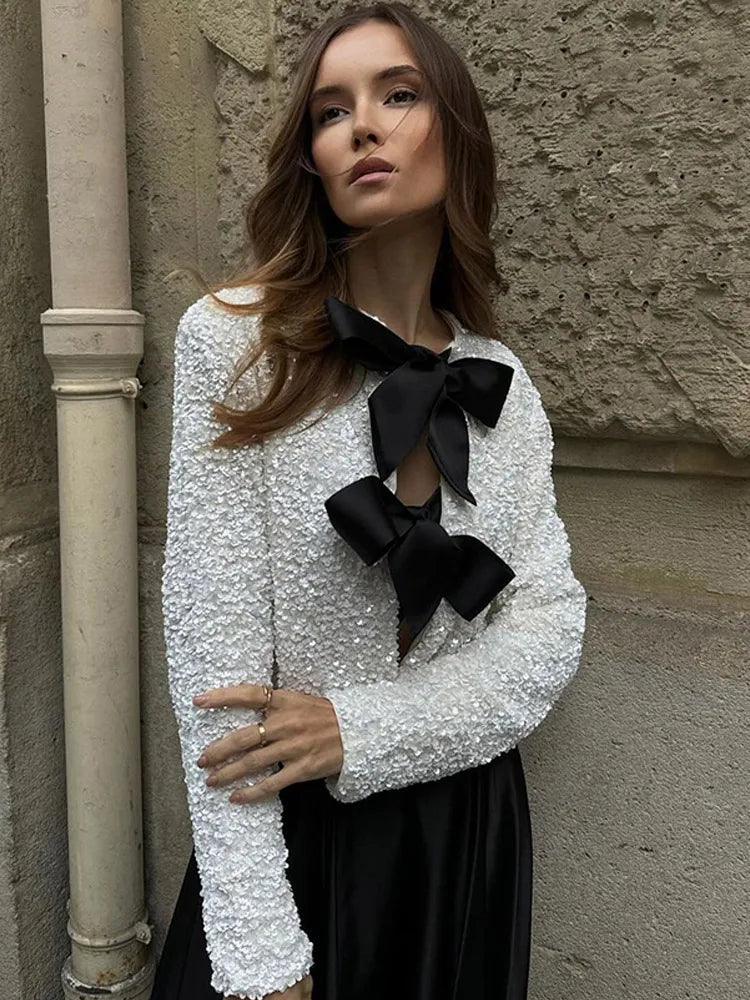 Sequin-Embellished Bow-Tie Statement Top”