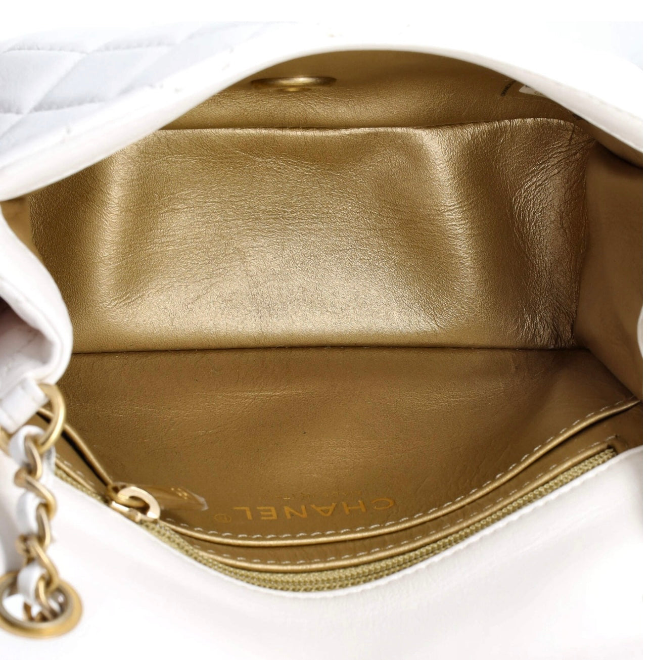 CHANEL
Lambskin Quilted CC Pearl Crush Mini Flap White