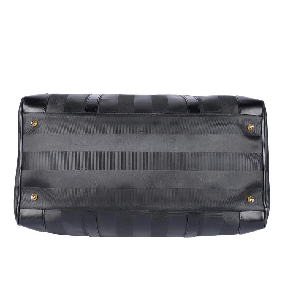 Authentic, pre-loved Fendi 2way duffle black travel handbag with strap. Features inside zipper pocket and black canvas and leather with stripes.
FAA approved for all airlines as a carry-on.
Shoulder drop: 34" - adjustable Made in France - 21"L x 9"W x 11"