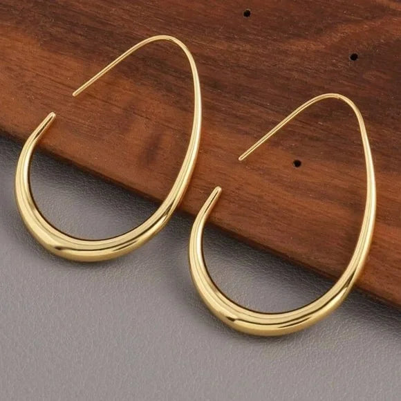 “Minimalist Gold Crescent Hoop Earrings”