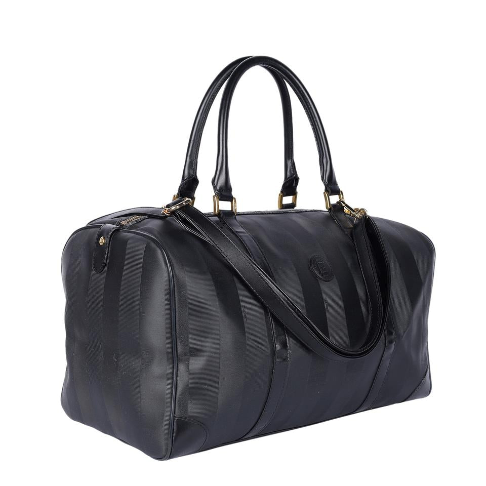 Authentic, pre-loved Fendi 2way duffle black travel handbag with strap. Features inside zipper pocket and black canvas and leather with stripes.
FAA approved for all airlines as a carry-on.
Shoulder drop: 34" - adjustable Made in France - 21"L x 9"W x 11"