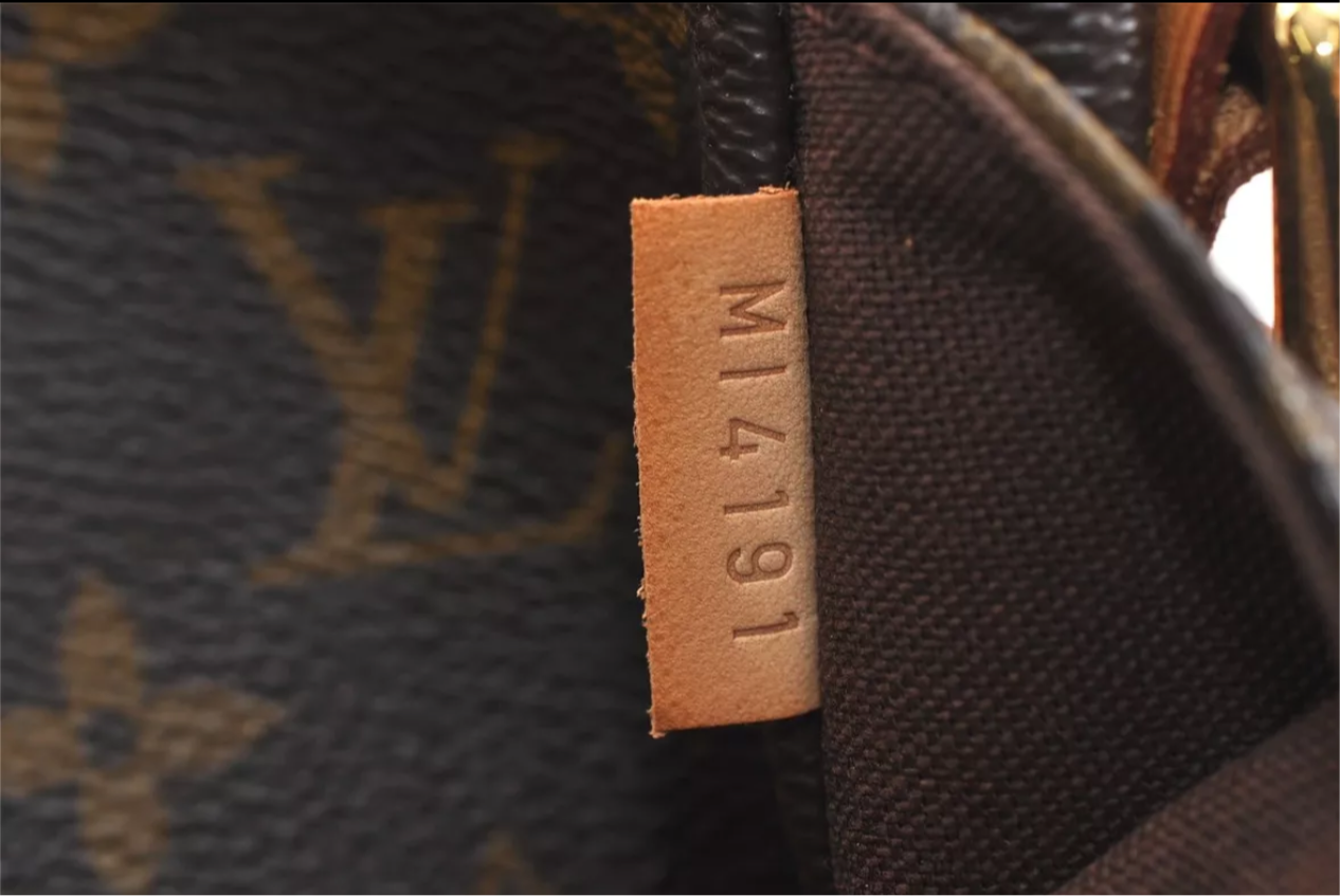 Louis Vuitton                                              Monogram Menilmontant MM Shoulder Bag