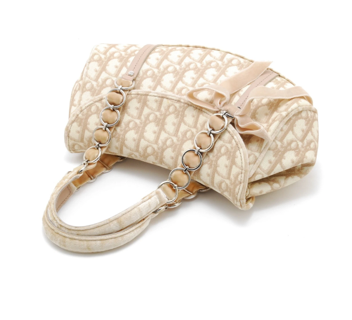 Christian Dior Vintage Trotter Romantique Flap Bag in beige Diorissimo coated canvas with natural leather trim and a velvet bow accent