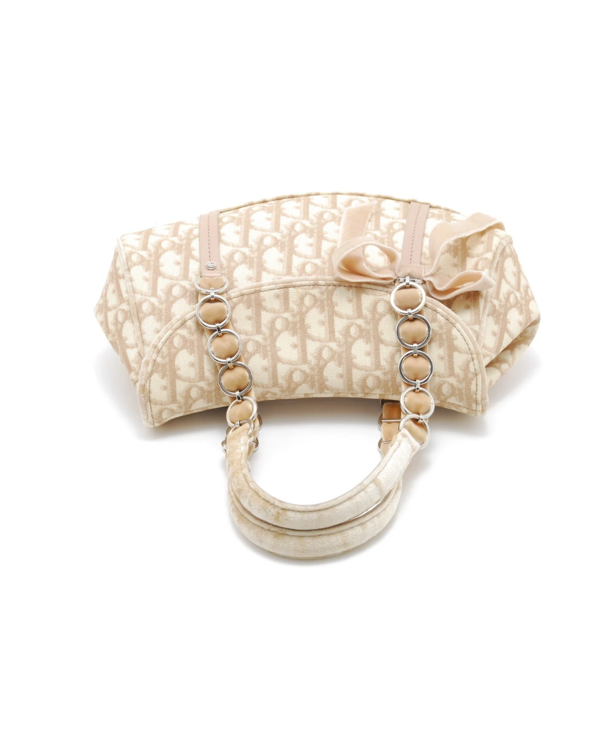 Christian Dior Vintage Trotter Romantique Flap Bag in beige Diorissimo coated canvas with natural leather trim and a velvet bow accent