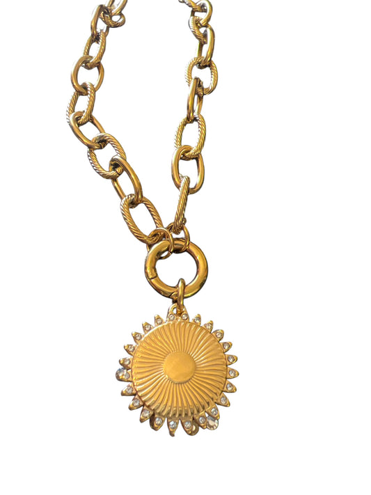 Gold sun pendant
